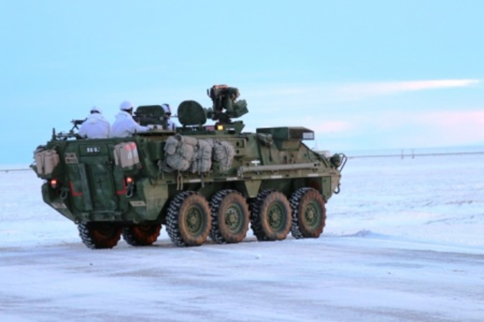 U.S. Army Alaska soldiers from Bravo Company, 3rd Battalion, 21st Infantry Regiment, 1st Stryker Brigade scan the Arctic tundra from the air-guard hatches of a Stryker vehicle operating outside Deadhorse, Alaska, during Operation Arctic Pegasus, Nov. 4, 2015. Courtesy photo