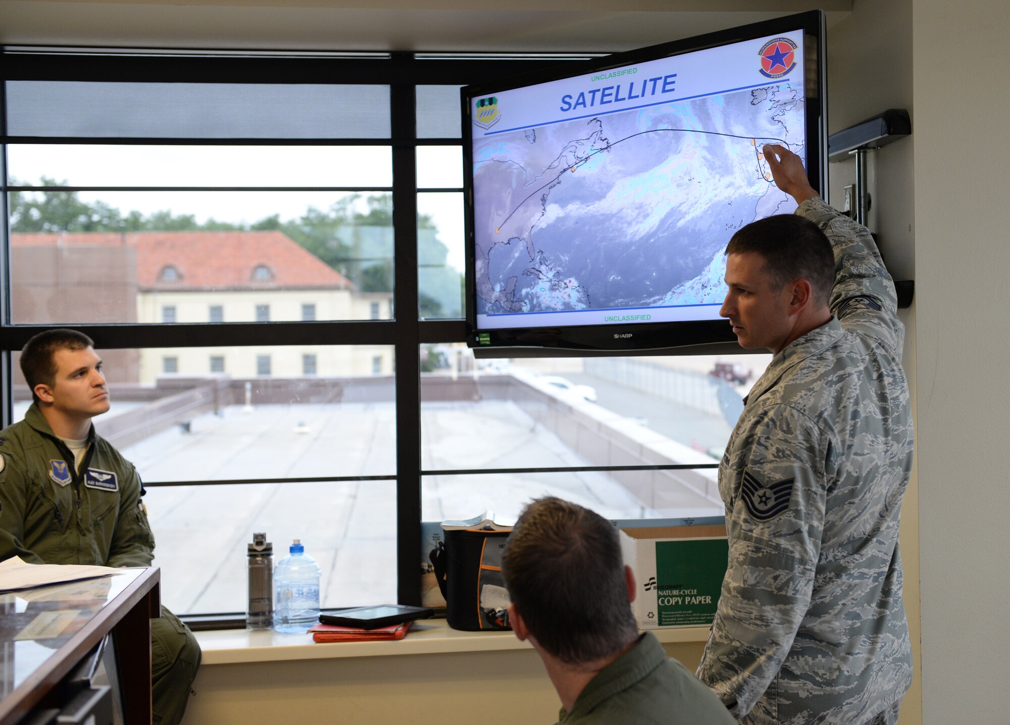 Tech. Sgt. Christopher Watts, 2nd Operations Support Squadron weather technician, briefs aircrew at Barksdale Air Force Base, La., Nov. 3, 2015, prior to a long-range bomber mission to the U.S. European Command area of operations in support of Trident Juncture 2015—the largest NATO exercise conducted in the past 20 years. During the non-stop sortie, which lasted approximately 26 hours, two B-52 aircrews flew from Barksdale AFB to the exercise area of operations where they executed a show-of-force in Spain, participated in a naval maritime strike scenario, and conducted a large force integration scenario in Portugal.(U.S. Air Force photo/Airman 1st Class Curt Beach)