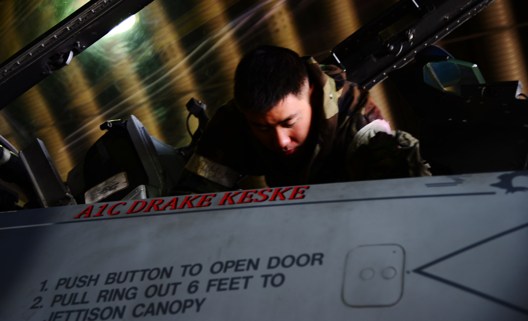 Senior Airman Brian Back, 36th Aircraft Maintenance Unit crew chief, checks inside the cockpit of an F-16 Fighting Falcon assigned to the 36th Fighter Squadron Nov. 4, 2015, at Osan Air Base, Republic of Korea. Members of the 36th AMU are participating in the large-scale readiness exercise Vigilant Ace 16. Throughout the exercise, Airmen launch and recover aircraft continuously during their 12-hour shifts. Vigilant Ace 16 is designed to enhance the interoperability of the U.S. and Republic of Korea Air Forces. (U.S. Air Force photo/Staff Sgt. Benjamin Sutton)