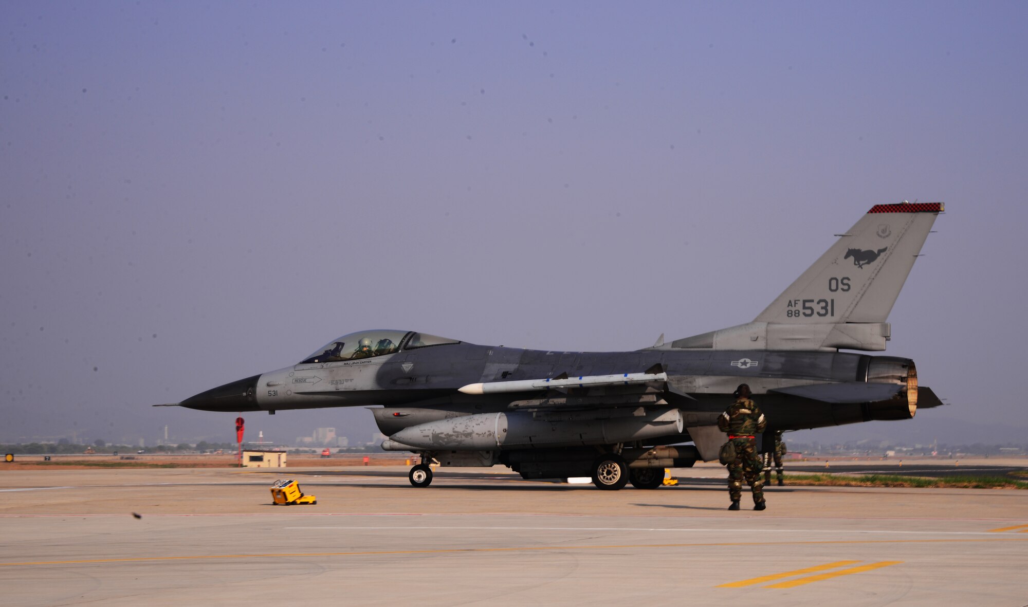 Airmen assigned to the 36th Aircraft Maintenance Unit perform final checks on an F-16 Fighting Falcon assigned to the 36th Fighter Squadron Nov. 4, 2015, at Osan Air Base, Republic of Korea. The Fiends are one of more than eight squadrons participating in Vigilant Ace 16. Vigilant Ace 16 is a large-scale exercise designed to enhance combat capabilities and interoperability of the U.S. and Republic of Korea Air Forces. (U.S. Air Force photo/Staff Sgt. Benjamin Sutton)