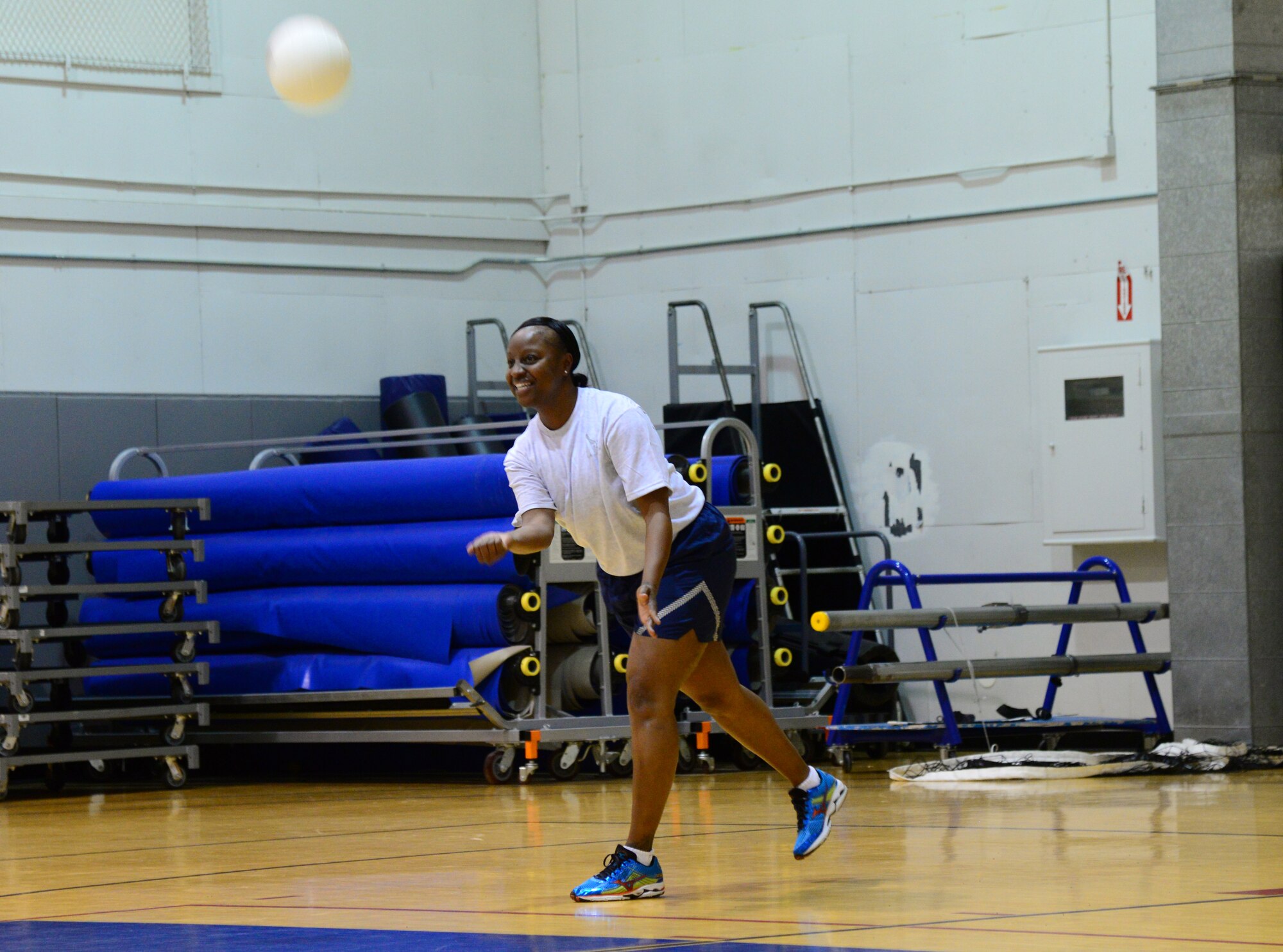 Master Sgt. Jeanette Berry, the 354th Wing Staff Agencies first sergeant, serves the ball during a spirited matchup between Eielson’s newest leaders and its seasoned chiefs and first sergeants Nov. 4, 2015, at Eielson Air Force Base, Alaska. Berry said it felt good to win the game against the Airman Leadership School students with a final score or 25-14. (U.S. Air Force photo by Airman 1st Class Cassandra Whitman/Released)