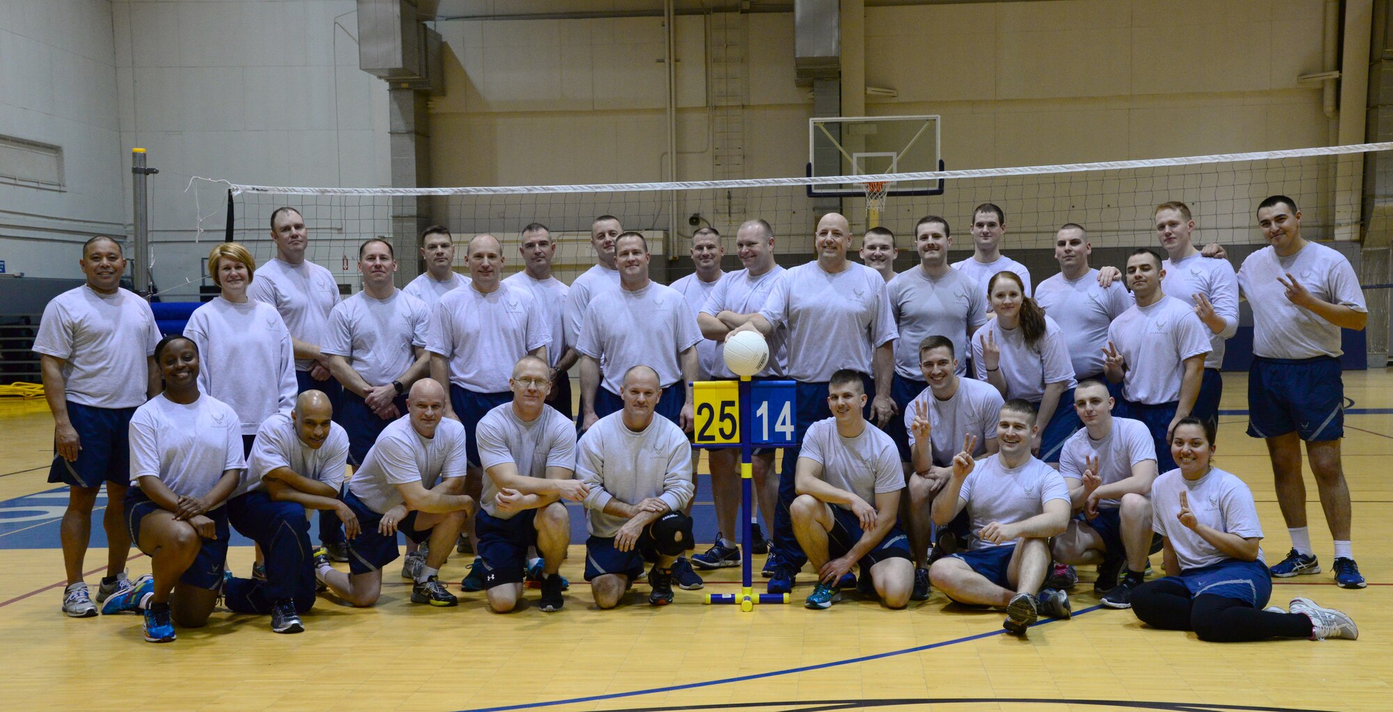 Airman Leadership School class 16-1 and senior noncommissioned officers (SNCOs) join together for a group photo Nov. 4, 2015, at Eielson Air Force Base, Alaska. The SNCOs, Eielson’s first sergeants and chiefs, won after four games with a final score of 25-14. (U.S. Air Force photo by Airman 1st Class Cassandra Whitman/Released)