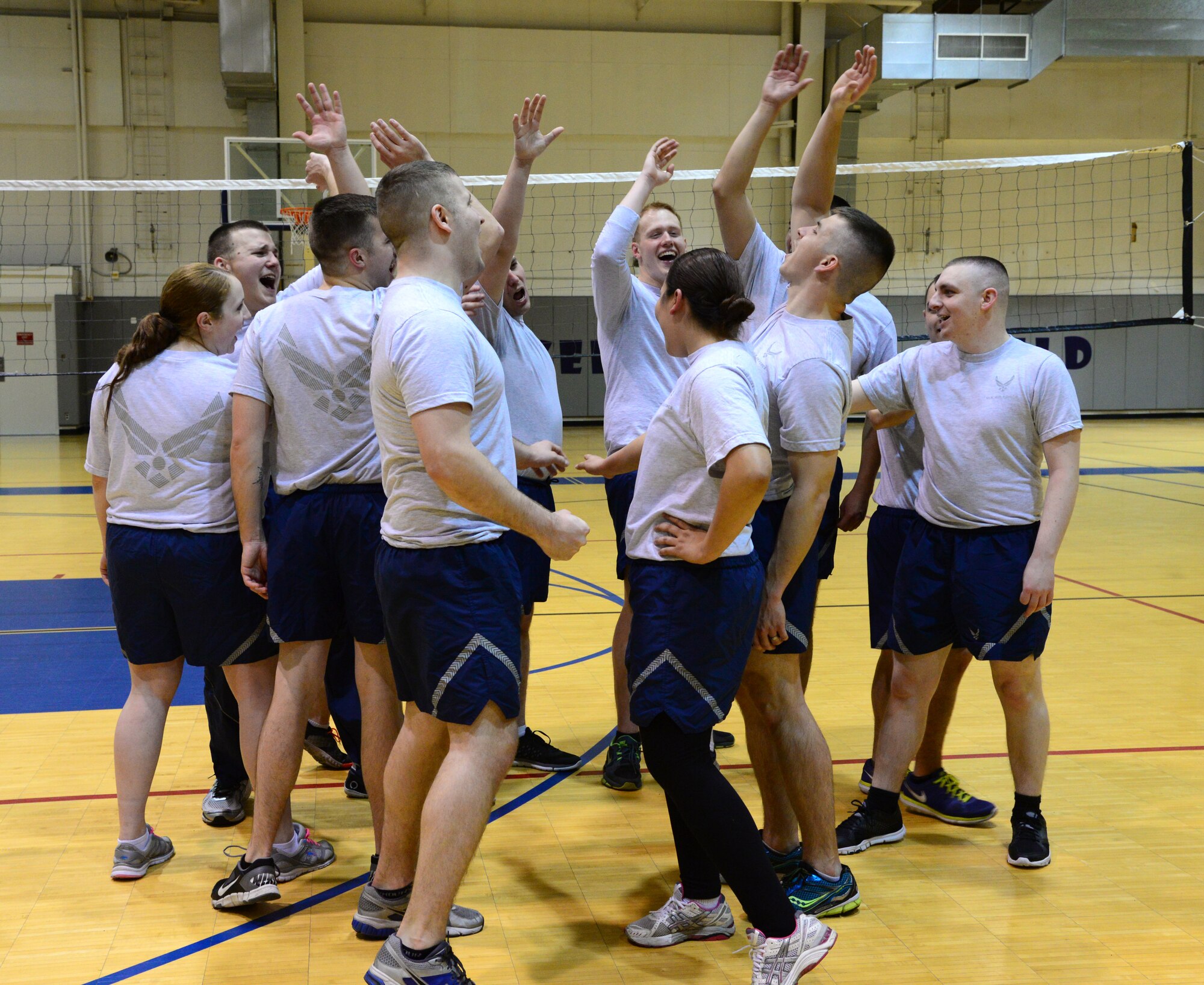Airman Leadership School (ALS) class 16-1 students says their chant at the end of the volleyball match played against Eielson’s first sergeants and chiefs Nov. 4, 2015, at Eielson Air Force Base, Alaska. The ALS class lost after four games against the SNCOs but kept in good spirits with team camaraderie. (U.S. Air Force photo by Airman 1st Class Cassandra Whitman/Released) 