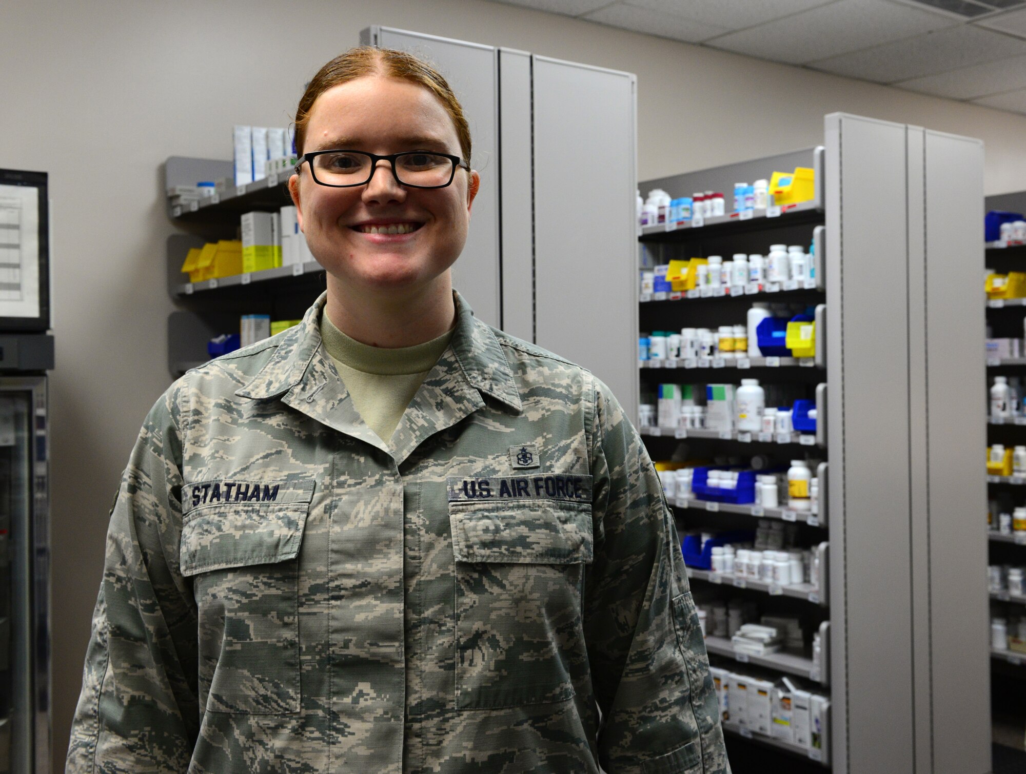 U.S. Air Force Staff Sgt. Nadine Statham, a 354th Medical Group pharmacy technician, takes a quick break from her duties Nov. 4, 2015, at Eielson Air Force Base, Alaska. Statham said her favorite part of Alaska is how everyone pitches in to help, which creates a family atmosphere. (U.S. Air Force photo by Airman 1st Class Cassandra Whitman/Released)