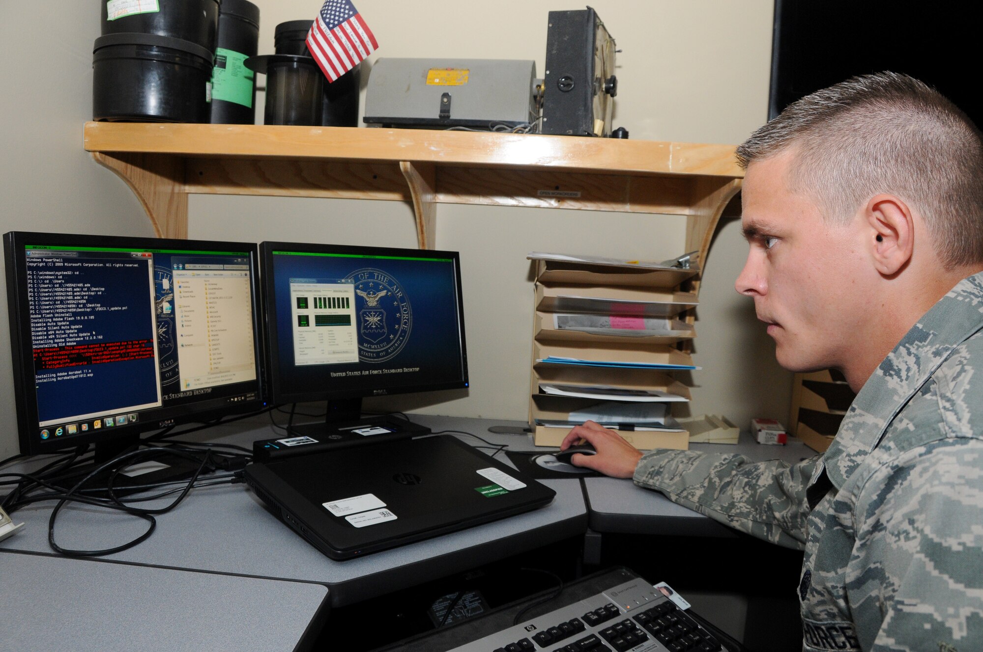 Senior Airman Tyler Price, information technology specialist and cyber systems operator, at Ebbing Air National Guard Base, Fort Smith, Ark., troubleshoots a laptop Oct. 26, 2015. Price was awarded the Airman of the Quarter award Sept. 30 for exemplifying leadership and performance skills, self-improvement and physical fitness as well as base and community involvement. (U.S. Air National Guard photo by Senior Airman Cody Martin/Released)