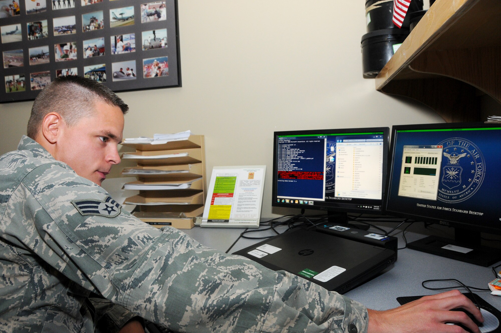 Senior Airman Tyler Price, information technology specialist and cyber systems operator, at Ebbing Air National Guard Base, Fort Smith, Ark., troubleshoots a laptop Oct. 26, 2015. Price was awarded the Airman of the Quarter award Sept. 30 for exemplifying leadership and performance skills, self-improvement and physical fitness as well as base and community involvement. (U.S. Air National Guard photo by Senior Airman Cody Martin/Released)