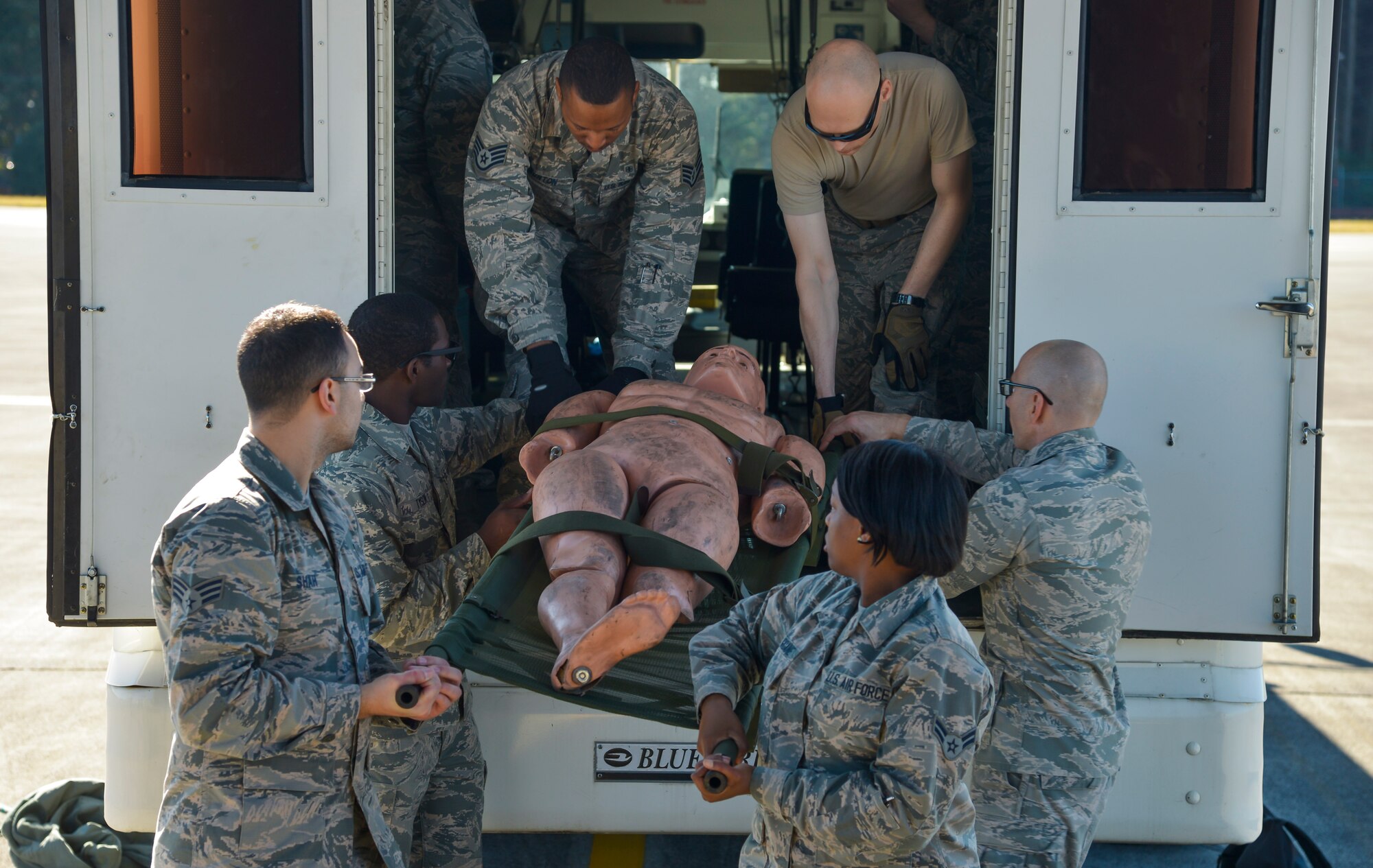 Airmen from the 374th Medical Group practice on-loading and off-loading simulated injured personnel from a C-130J Super Hercules, assigned to the California Air National Guard 146th Airlift Wing, during a medical evacuation training scenario at Yokota Air Base, Japan, Nov. 4, 2015.
The medevac training consisted of litter carry scenarios, an obstacle course and high-deck patient loading platform vehicle training. As the Western Pacific mobility hub, Yokota Air Base will be a key location in the event of regional instability, and this exercise gives the installation a chance to test those capabilities in a realistic scenario.  (U.S. Air Force photo by Senior Airman David Owsianka/Released)