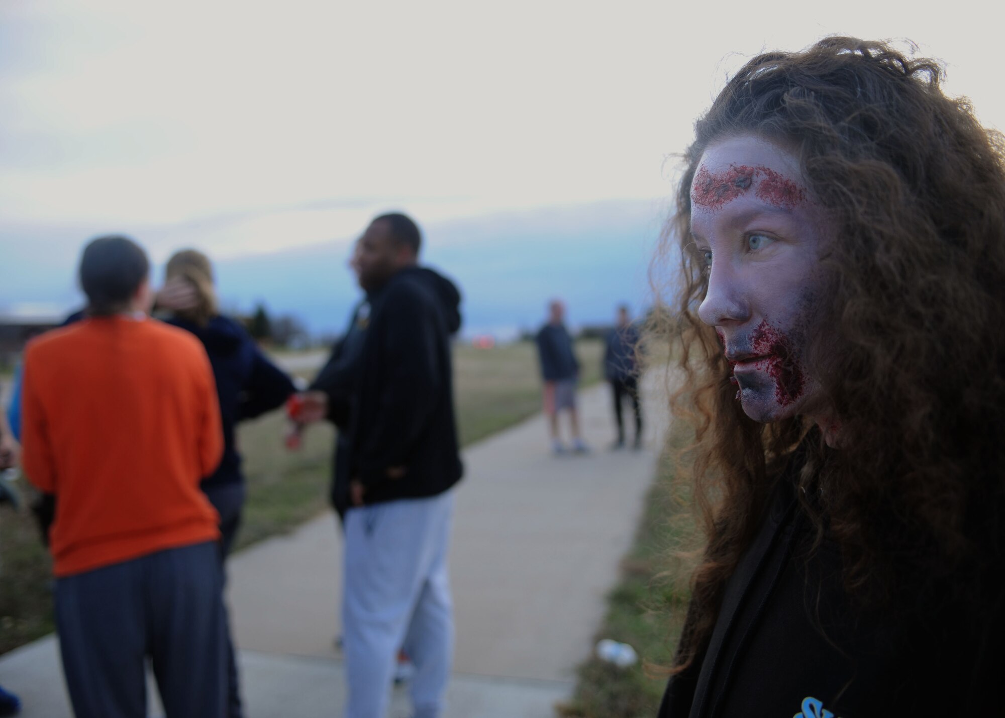Airmen participate in a Zombie 5k run at Ellsworth Air Force Base, S.D., Oct. 30, 2015. Participating in physical activities and maintaining healthy nutrition habits help Airmen stay fit to fight. (U.S. Air Force photo by Airman Sadie Colbert/Released)