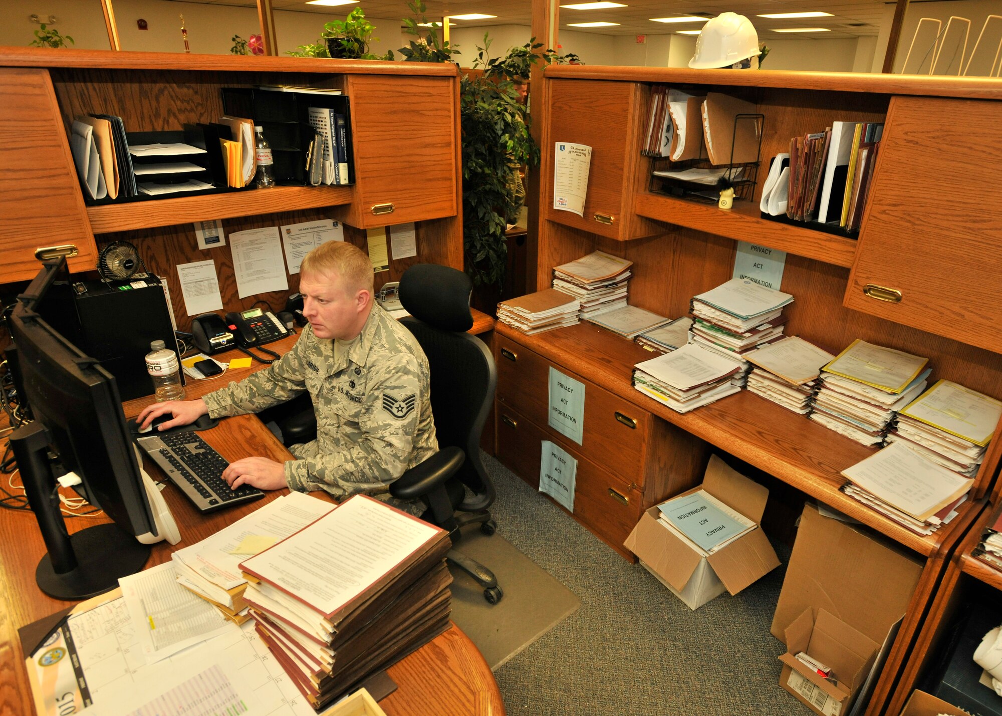 Staff Sgt. Patrick Eldridge, 319th Contracting Flight contract specialist, analyzes and reviews documents in the 319th CONF office Nov. 5, 2015, on Grand Forks Air Force Base, North Dakota. The Grayslake, Illinois native was named the Warrior of the Week for the first week of November 2015. (U.S. Air Force photo by Senior Airman Xavier Navarro/Released)