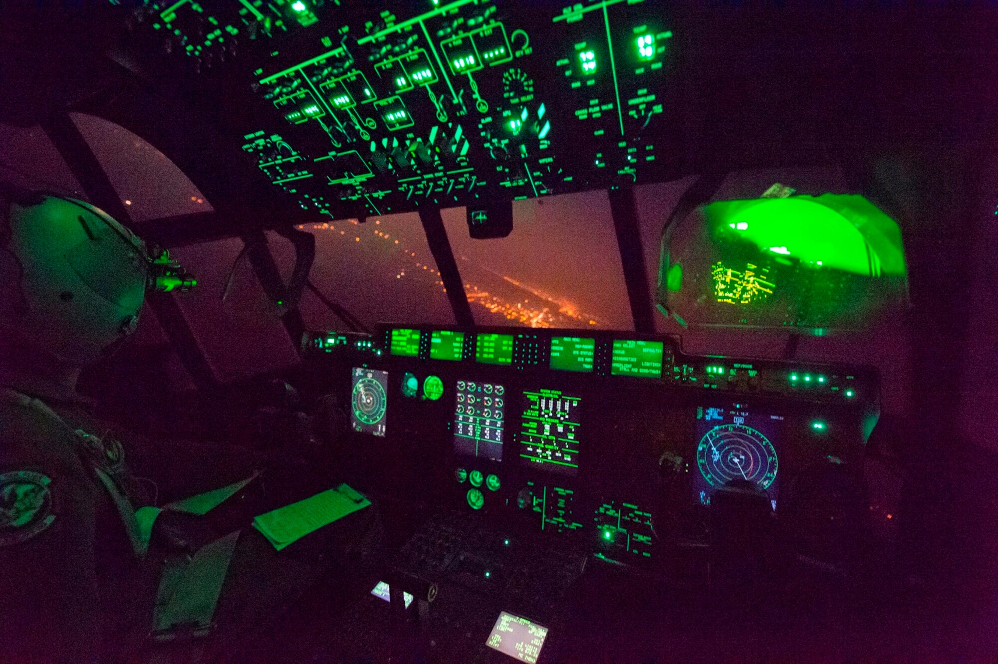 A U.S. 37th Airlift Squadron pilot flies a C-130J Super Hercules during Aviation Detachment 16-1, Oct. 30, 2015, above Powidz Air Base, Poland. The training deployment gave Airmen from the 86th Airlift Wing an opportunity to work closely with the Polish air force, helping the NATO allies complete training requirements and build a better bond between both countries. (U.S. Air Force photo/Senior Airman Damon Kasberg)
