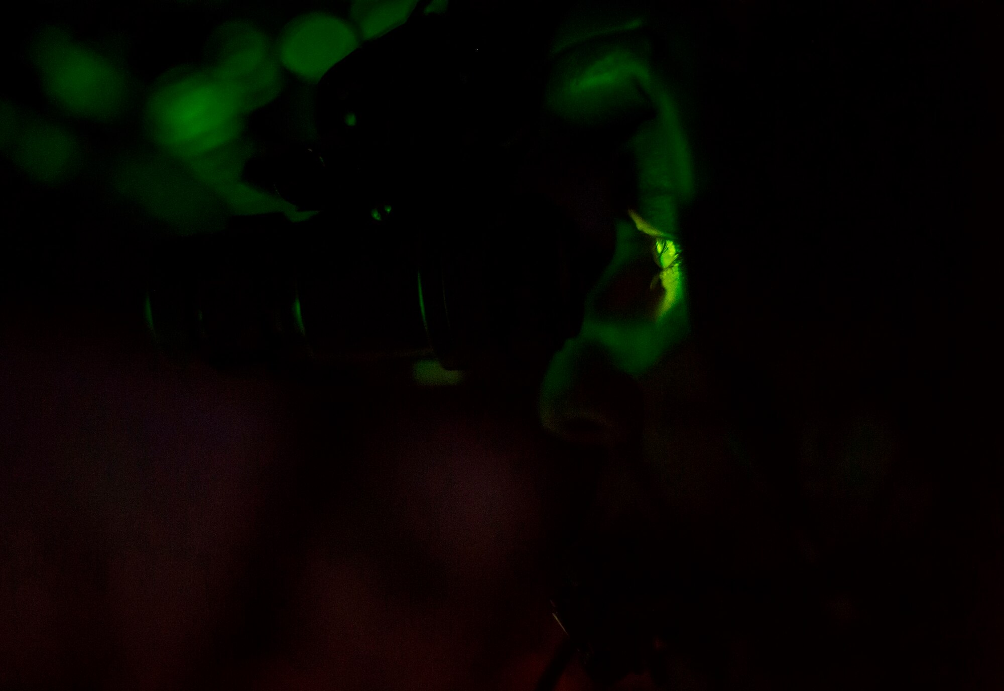 A U.S. Air Force C-130J Super Hercules pilot flies while wearing night-vision goggles during Aviation Detachment 16-1, Oct. 30, 2015 above Powidz, Poland. The flying training deployment was a bilateral training opportunity with the Polish air force in support of Operation Atlantic Resolve. As part of the deployment pilots and loadmasters from the 37th AS performed maneuvers, airdrops and unimproved landings at night. (U.S. Air Force photo/Senior Airman Damon Kasberg)