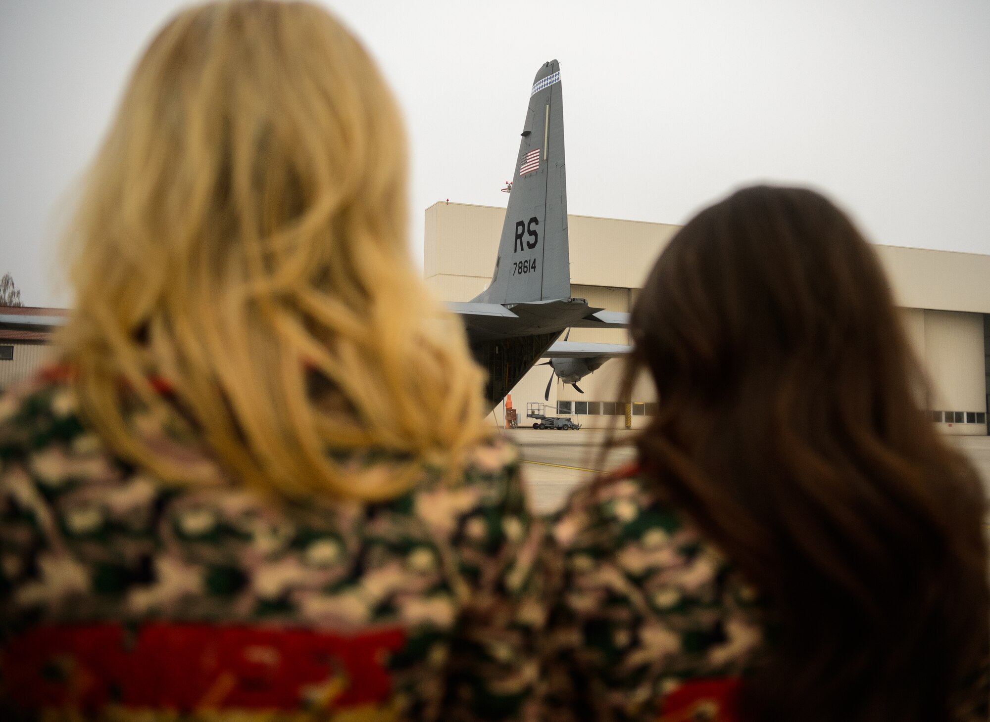 Two Kansas City Chiefs cheerleaders view one of Ramstein’s C-130J Super Hercules during a base tour Nov. 2, 2015, at Ramstein Air Base, Germany. The cheerleaders learned about the base and the capabilities it provides to the European area of operation and beyond. (U.S.  Air Force photo/Staff Sgt. Armando A. Schwier-Morales)