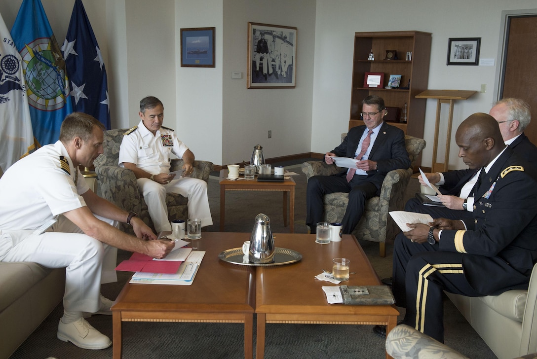 Defense Secretary Ash Carter, center back, meets with Navy Adm. Harry B. Harris Jr., commander of U.S. Pacific Command, during an office call at the command's headquarters on Camp H.M. Smith, Hawaii, Nov. 5, 2015. DoD photo by Air Force Senior Master Sgt. Adrian Cadiz