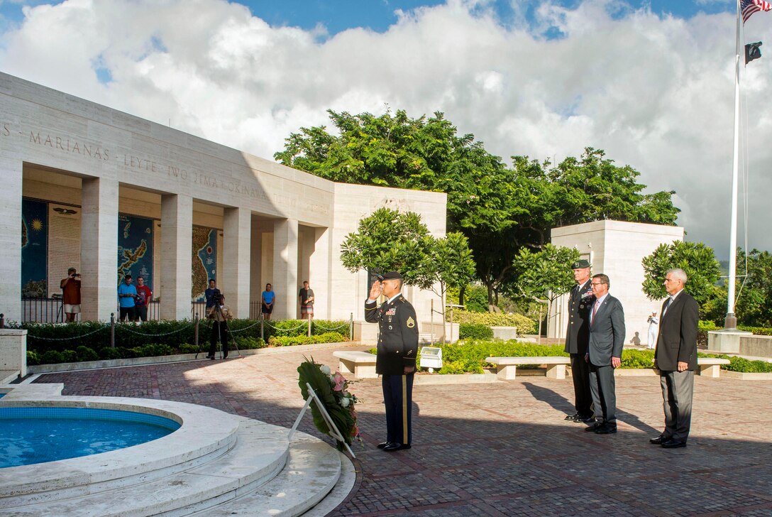 Defense Secretary Ash Carter participates in a wreath-laying ceremony with Army Maj. Gen. Eric P. Wendt, chief of staff of the U.S. Pacific Command, and Jim Horton, director of the National Memorial Cemetery of the Pacific, at the cemetery in Honolulu, Nov. 5, 2015. DoD photo by Air Force Senior Master Sgt. Adrian Cadiz