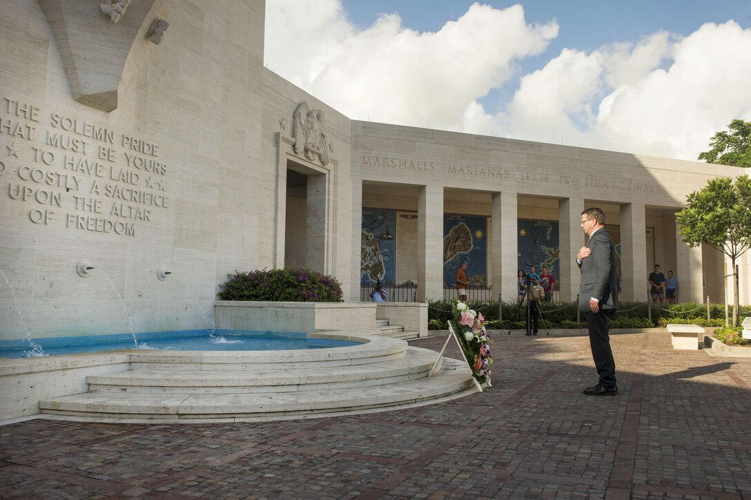 Defense Secretary Ash Carter places his hand over his heart after laying a wreath to pay his respects to the fallen at the National Memorial Cemetery of the Pacific in Honolulu, Nov. 5, 2015. DoD photo by Air Force Senior Master Sgt. Adrian Cadiz