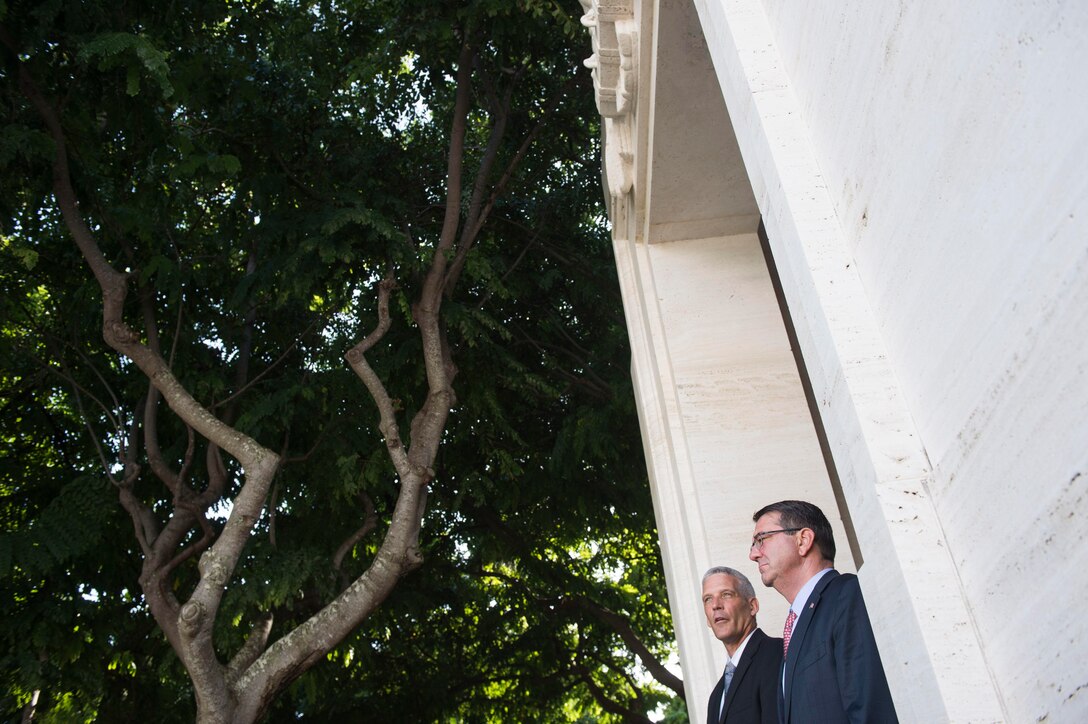 Jim Horton, director of the National Memorial Cemetery of the Pacific, gives Defense Secretary Ash Carter a historical overview of the cemetery in Honolulu, Nov. 5, 2015. DoD photo by Air Force Senior Master Sgt. Adrian Cadiz