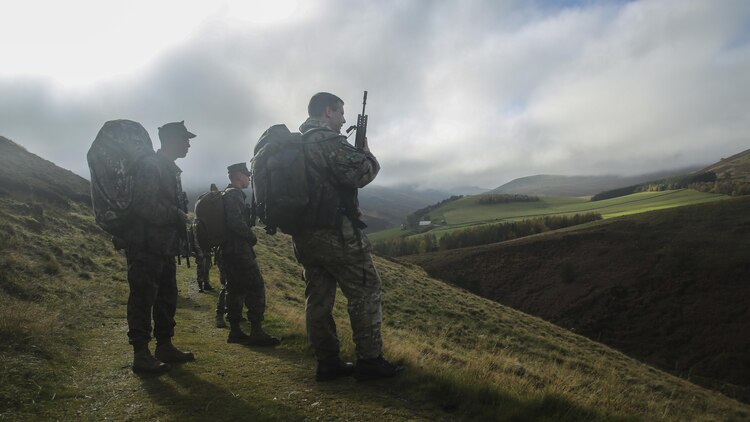 U.S. Marines with 2nd Intelligence Battalion and British soldiers search for a checkpoint during Exercise Phoenix Odyssey II near Edinburgh, U.K., Oct. 30, 2015. The service members executed a three-mile conditioning hike and shooting competition as part of the exercise, which is designed to enhance joint intelligence operations. 