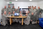 Soldiers with the Pennsylvania National Guard's Detachment 1, Company C, 1-169th Aviation, speak with one of their fellow soldiers, Army Sgt. Shawn Crum, via video call Nov. 20, 2011. The Soldiers are currently deployed as part of Multinational Battle Group East in support of the NATO-led peacekeeping mission Kosovo Forces 14. Crum, originally scheduled to deploy with the unit, was diagnosed with cancer and has been undergoing treatment.
City: