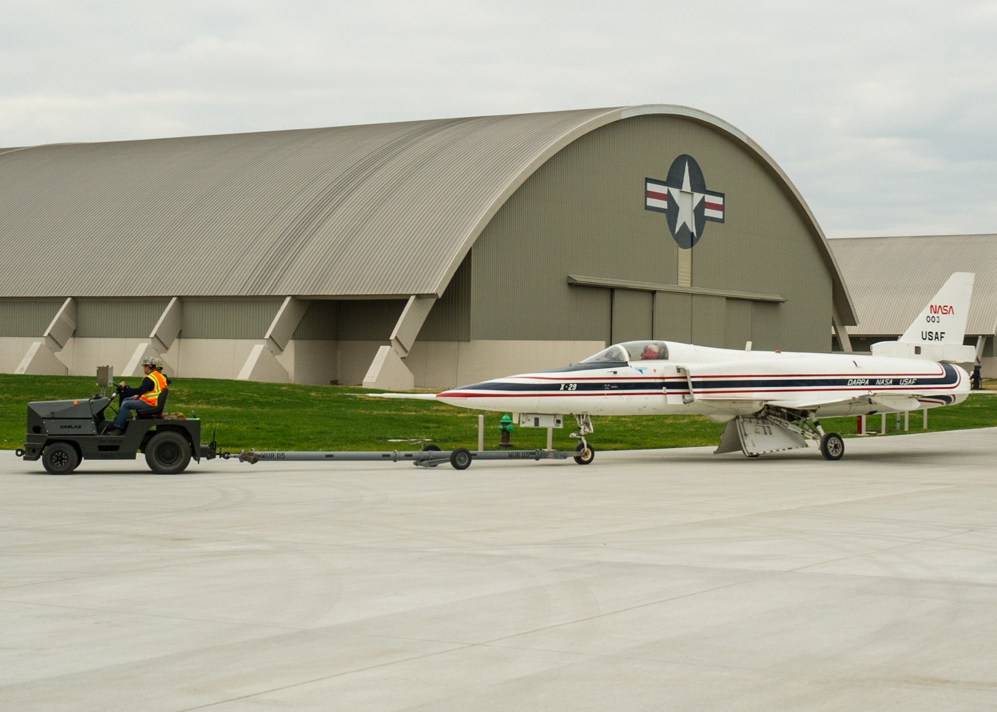 Restoration staff move the Grumman X-29A into the new fourth building at the National Museum of the U.S. Air Force on Nov. 5, 2015. (U.S. Air Force photo by Ken LaRock)