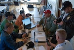 Key players in the communications exercise, Operation Omega, combined efforts to repair communications after a simulated terrorist attack occurred. Operation Omega brought together the Florida National Guard and 25 response teams from local, state and national agencies.