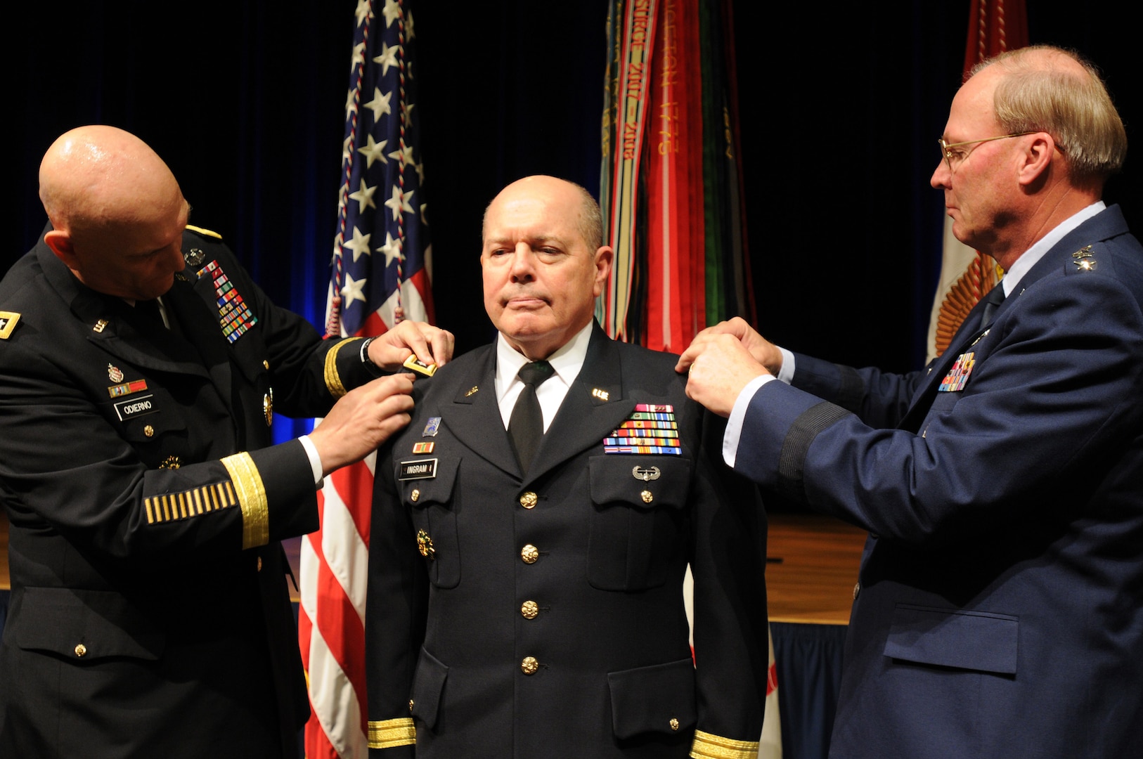 Army Lt. Gen. William E. Ingram, Jr., director of the Army National Guard, is pinned as a lieutenant general by Army Gen. Ray Odierno, chief of staff of the Army, and Air Force Gen. Craig McKinley, chief of the National Guard Bureau, during a ceremony Nov. 28, 2011 at the Pentagon in Arlington, Va.