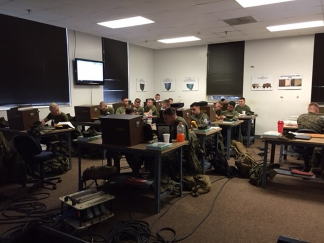 On November 3, 2015 Marines attached to Basic Refrigeration Air Conditioning Technician course 6-15 (BRACT 6-15) at Marine Corps Engineer School, Camp Lejeune, North Carolina work with electrical trainers in order to learn how to build solid state power supplies using transformers, diodes, and capacitor filters. 


