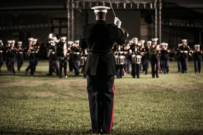 Warrant Officer DeMarius Jackson conducts the band during a performance at the Bermuda 50th Regiment Tattoo, 22-24 October. The Bermuda Tattoo presented a world-class spectacle of music and military precision at the historic grounds of the Keep Yard, Royal Naval Dockyard. Performers from the United States, United Kingdom, Canada and the Caribbean joined the Royal Bermuda Regiment Band and Corps of Drums. Jackson is the officer in charge of the band. (Courtesy Photo)