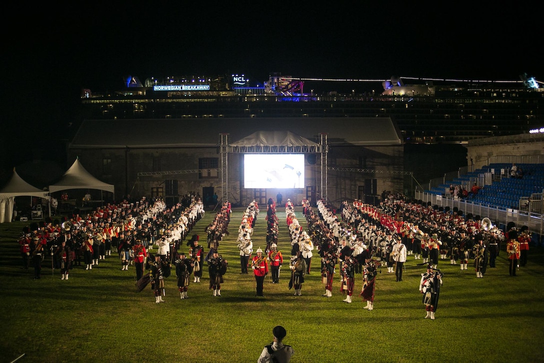 2nd Marine Aircraft Wing Band performs alongside other units during a mass performance at the Bermuda 50th Regiment Tattoo, 22-24 October. The Bermuda Tattoo presented a world-class spectacle of music and military precision at the historic grounds of the Keep Yard, Royal Naval Dockyard. Performers from the United States, United Kingdom, Canada and the Caribbean joined the Royal Bermuda Regiment Band and Corps of Drums. (Courtesy Photo)