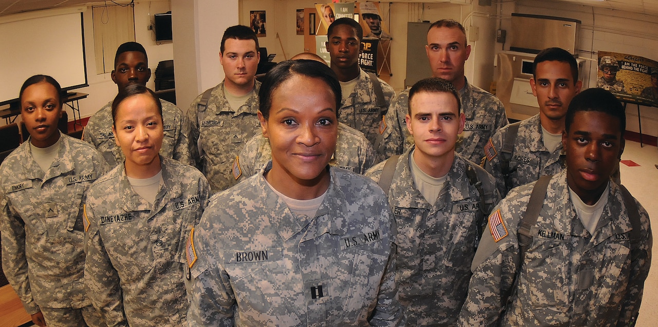 Army Capt. Rolona Brown, the commander of Echo Company, 266th Quartermaster Battalion, stands with advanced individual training soldiers assigned to her unit at Joint Base Langley-Eustis. The High Point, N.C., native was one of three women selected to appear in a Lifetime channel documentary focusing on military women. U.S. Army photo by Terrance Bell