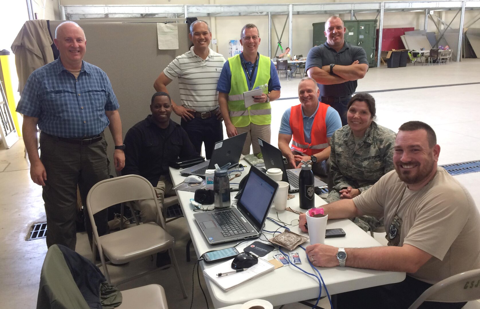 Andre Hinson, seated to the left, and other members of the Defense Logistics Agency Assessment Team take part in Joint Task Force Port Opening’s exercise Turbo Distribution 16-1 at Camp Shelby, Hattiesburg, Mississippi, Oct. 29.