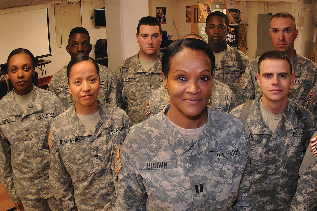 Capt. Rolona Brown, commander, Echo Company, 266th Quartermaster Battalion, at Joint Base Langley-Eustis, stands with advanced individual training soldiers assigned to her unit.  The High Point, N.C., native was one of three women selected to appear in a Lifetime channel documentary focusing on military women titled "Women of Honor." 