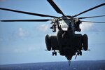 A CH-53E Super Stallion from the Hawaii-based Marine Medium Helicopter Squadron 463 lands aboard USS Makin Island Nov. 23, 2011.