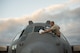 Staff Sgt. Ryan Tucker, a C-130 Hercules crew chief assigned to the West Virginia National Guard's 130th Airlift Squadron, wipes down his aircraft's windshield during preflight ground checks in preparation for Exercise Turbo Distribution in Gulfport, Miss., Oct. 28, 2015. The U.S. Transportation Command exercise tests the joint task force-port opening's ability to deliver and distribute cargo during humanitarian relief operations. (U.S. Air Force photo/Staff Sgt. Larry E. Reid Jr.)