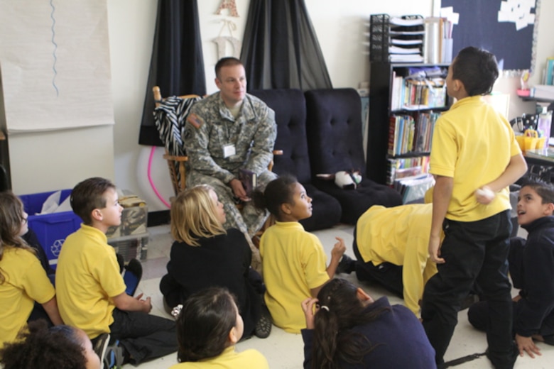 U.S. Army Corps of Engineers (USACE), Buffalo District Deputy District Commander MAJ Jared E. Runge reads to elementary school students to support the “Celebration of Reading” program. 