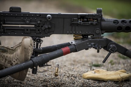 A U.S. Army Reserve Soldier from the 384th Military Police Battalion, headquartered at Fort Wayne, Ind., shoots rounds on an M2 Browning .50-caliber machine gun during a familiarization range at Camp Atterbury, Ind., Nov. 5. The 384th MP Battalion organized a three-day range and field training exercise involving more than 550 U.S. Army Reserve Soldiers and incorporated eight different weapons systems, combat patrolling and a rifle marksmanship competition at Camp Atterbury Nov. 5-7. (U.S. Army photo by Master Sgt. Michel Sauret)