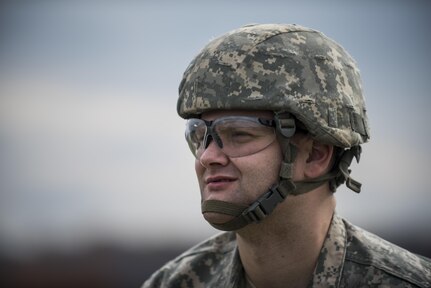 Spc. Josh Delles, a U.S. Army Reserve Soldier with the 354th Military Police Company, of St. Louis, looks on during an M2 Browning .50-caliber machine gun familiarization range at Camp Atterbury, Ind., Nov. 5. The 384th Military Police Battalion, headquartered at Fort Wayne, Ind., organized a three-day range and field training exercise involving more than 550 U.S. Army Reserve Soldiers and incorporated eight different weapons systems, plus combat patrolling and a rifle marksmanship competition at Camp Atterbury, Ind., Nov. 5-7. (U.S. Army photo by Master Sgt. Michel Sauret)