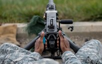 A U.S. Army Reserve Soldier from the 354th Military Police Company, of St. Louis, releases the trigger of an M2 Browning .50-caliber machine gun during a familiarization range at Camp Atterbury, Ind., Nov. 5. The 384th Military Police Battalion, headquartered at Fort Wayne, Ind., organized a three-day range and field training exercise involving more than 550 U.S. Army Reserve Soldiers and incorporated eight different weapons systems, plus combat patrolling and a rifle marksmanship competition at Camp Atterbury, Ind., Nov. 5-7. (U.S. Army photo by Master Sgt. Michel Sauret)