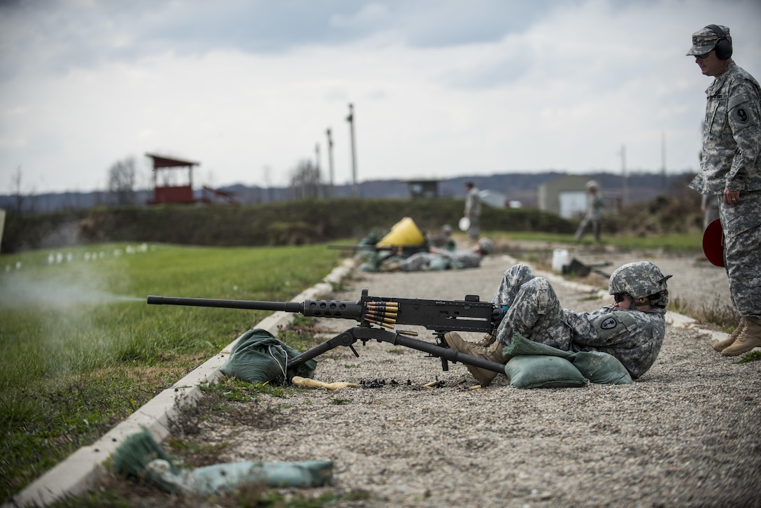 Cpl. Brittany Montana, a U.S. Army Reserve Soldier with the 354th Military Police Company, of St. Louis, fires an M2 Browning .50-caliber machine gun during a familiarization range at Camp Atterbury, Ind., Nov. 5. The 384th Military Police Battalion, headquartered at Fort Wayne, Ind., organized a three-day range and field training exercise involving more than 550 U.S. Army Reserve Soldiers and incorporated eight different weapons systems, plus combat patrolling and a rifle marksmanship competition at Camp Atterbury, Ind., Nov. 5-7. (U.S. Army photo by Master Sgt. Michel Sauret)