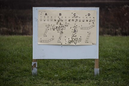 A paper target is littered with holes after a fire iteration of an M2 Browning .50-caliber machine gun familiarization range at Camp Atterbury, Ind., Nov. 5. The 384th Military Police Battalion, headquartered at Fort Wayne, Ind., organized a three-day range and field training exercise involving more than 550 U.S. Army Reserve Soldiers and incorporated eight different weapons systems, plus combat patrolling and a rifle marksmanship competition at Camp Atterbury, Ind., Nov. 5-7. (U.S. Army photo by Master Sgt. Michel Sauret)