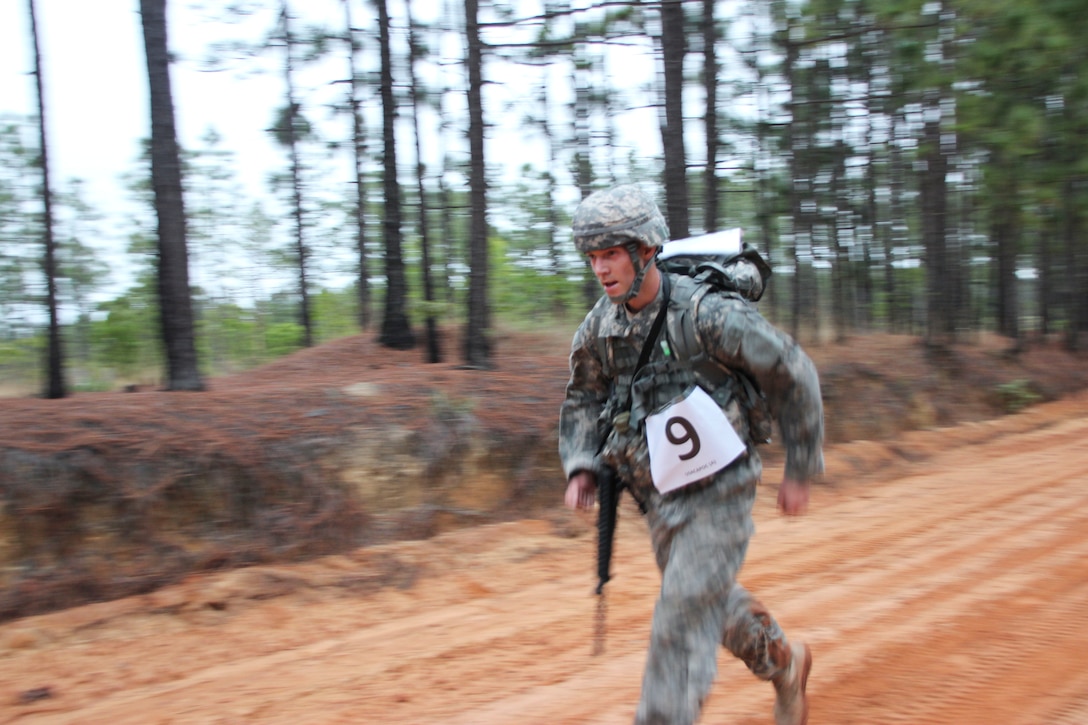 Staff Sgt. Andrew Paulsen, 350th Civil Affairs Command, runs to the finish line of his 10 kilometer ruck march, May 1. Paulsen finished second, just mere seconds behind the first man to cross.
U.S. Army Civil Affairs & Psychological Operations Command (Airborne) competitors came from around the country to compete in this year's Best Warrior Competition held at Fort Bragg, N.C., April 29 through May 3, to earn the honor of representing the command at the U.S. Army Reserve Command's competition in June. (U.S. Army photo by Staff Sgt. Sharilyn Wells/USACAPOC(A))