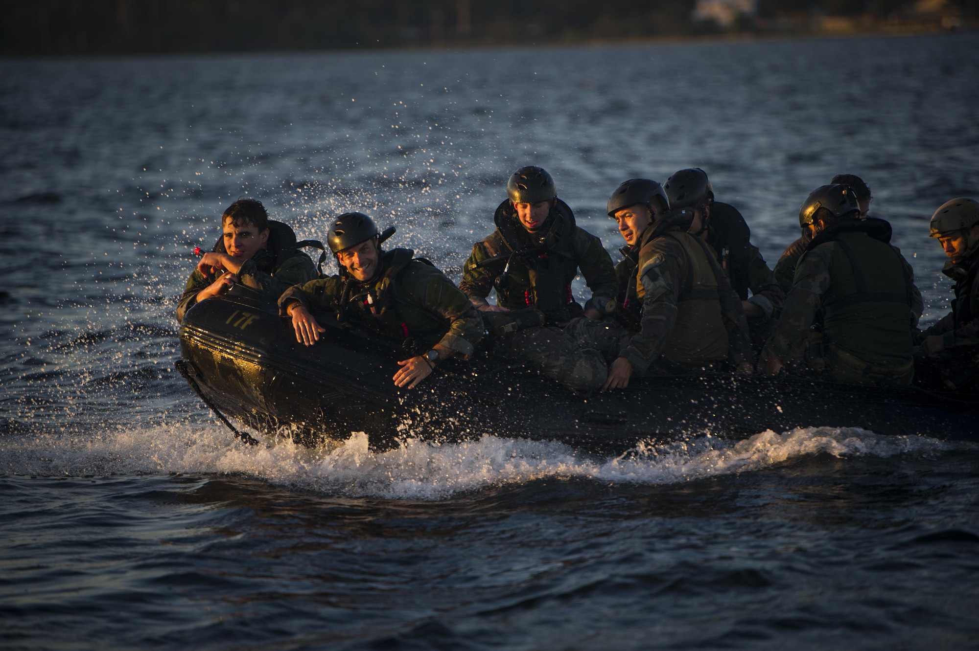 Marine Raiders with the Marine Corp Special Operations Command perform helocast training with the 160th Special Operations Aviation Regiment out of Fort Campbell, Kentucky, at Hurlburt Field, Fla., Oct. 29, 2015. The Raiders spent a week at Hurlburt Field to perform specialized training. (U.S. Air Force photo by Senior Airman Christopher Callaway) 