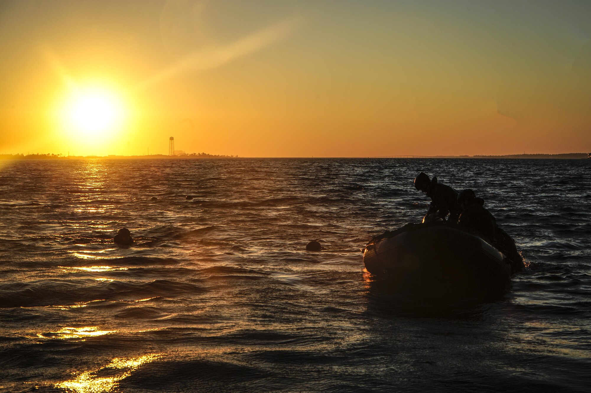 Marine Raiders with the Marine Corp Special Operations Command perform helocast training with the 160th Special Operations Aviation Regiment out of Fort Campbell, Kentucky, at Hurlburt Field, Fla., Oct. 29, 2015. The Raiders spent a week at Hurlburt Field to perform specialized training. (U.S. Air Force photo by Senior Airman Christopher Callaway) 