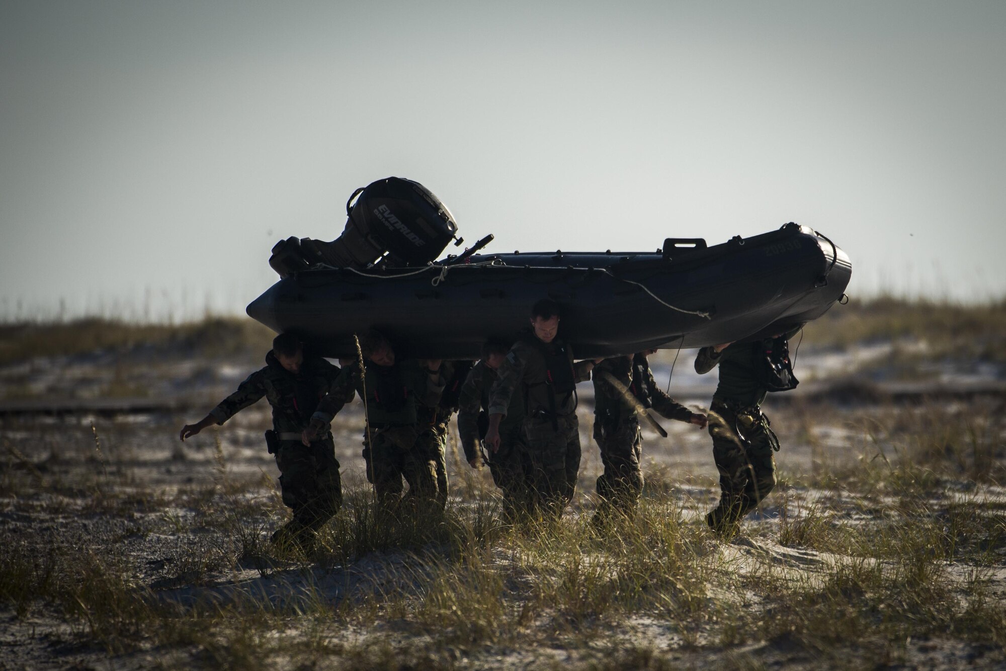 Marine Raiders with the Marine Corp Special Operations Command perform helocast training with the 160th Special Operations Aviation Regiment out of Fort Campbell, Kentucky, at Hurlburt Field, Fla., Oct. 29, 2015. The Raiders spent a week at Hurlburt Field to perform specialized training. (U.S. Air Force photo by Senior Airman Christopher Callaway) 