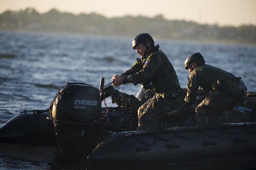 Marine Raiders with the Marine Corp Special Operations Command perform helocast training with the 160th Special Operations Aviation Regiment out of Fort Campbell, Kentucky, at Hurlburt Field, Fla., Oct. 29, 2015. The Raiders spent a week at Hurlburt Field to perform specialized training. (U.S. Air Force photo by Senior Airman Christopher Callaway) 