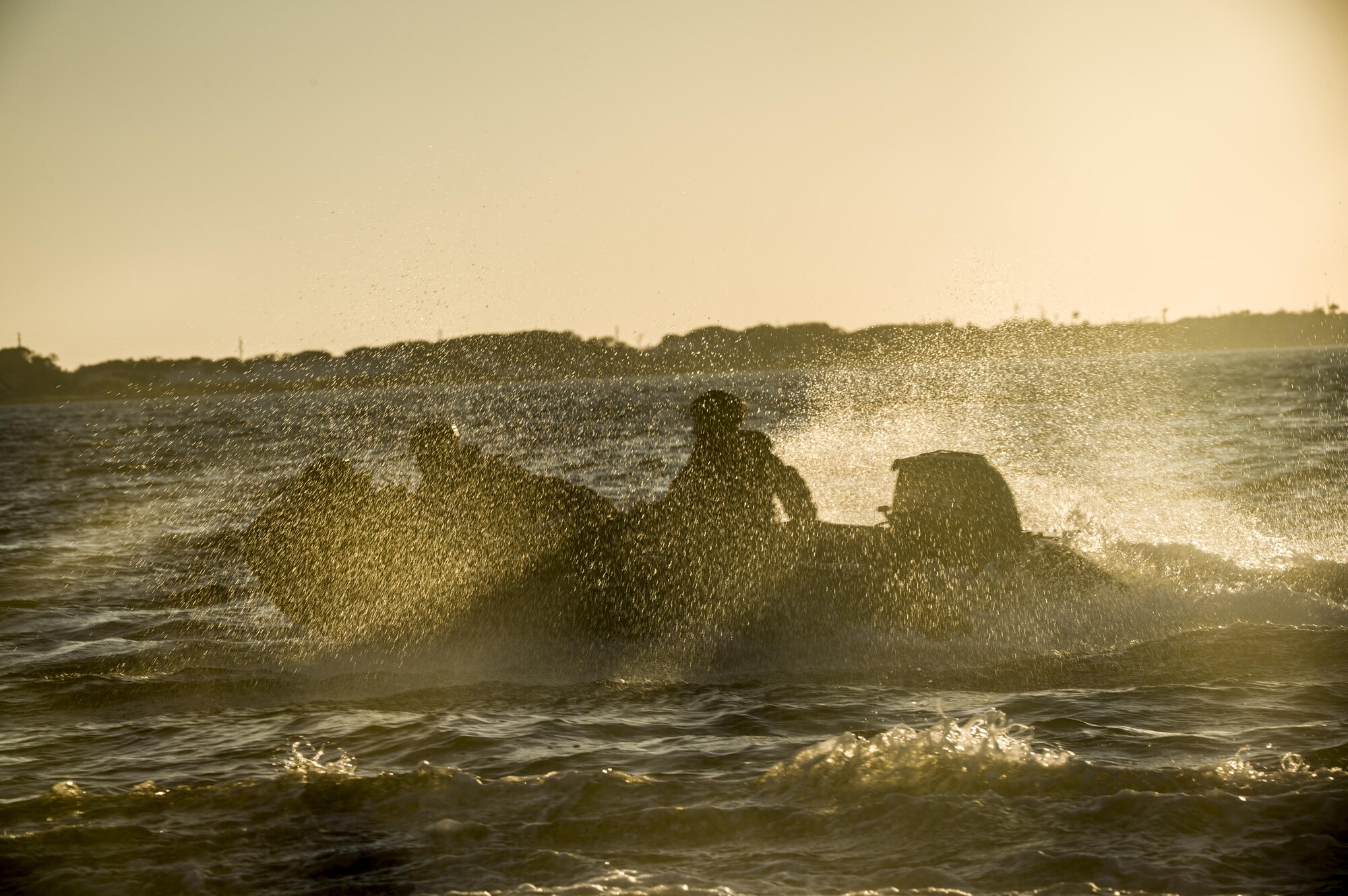 Marine Raiders with the Marine Corp Special Operations Command perform helocast training with the 160th Special Operations Aviation Regiment out of Fort Campbell, Kentucky, at Hurlburt Field, Fla., Oct. 29, 2015. The Raiders spent a week at Hurlburt Field to perform specialized training. (U.S. Air Force photo by Senior Airman Christopher Callaway) 
