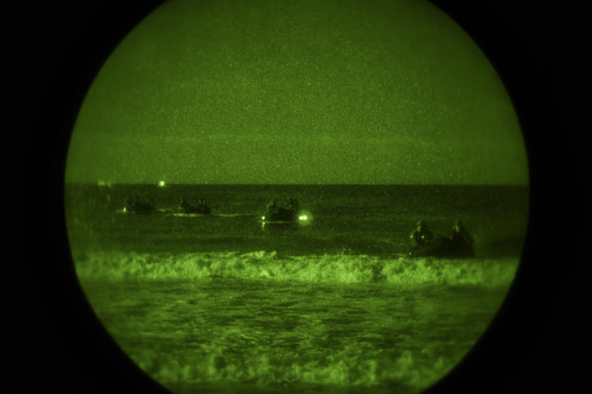 Marine Raiders with the Marine Corp Special Operations Command perform infiltration training at the Eglin Range, Fla., Oct. 30, 2015. The Raiders were dropped 12 miles off the shore and navigated through the darkness to infiltrate a pre-designated compound. (U.S. Air Force photo by Senior Airman Christopher Callaway) 