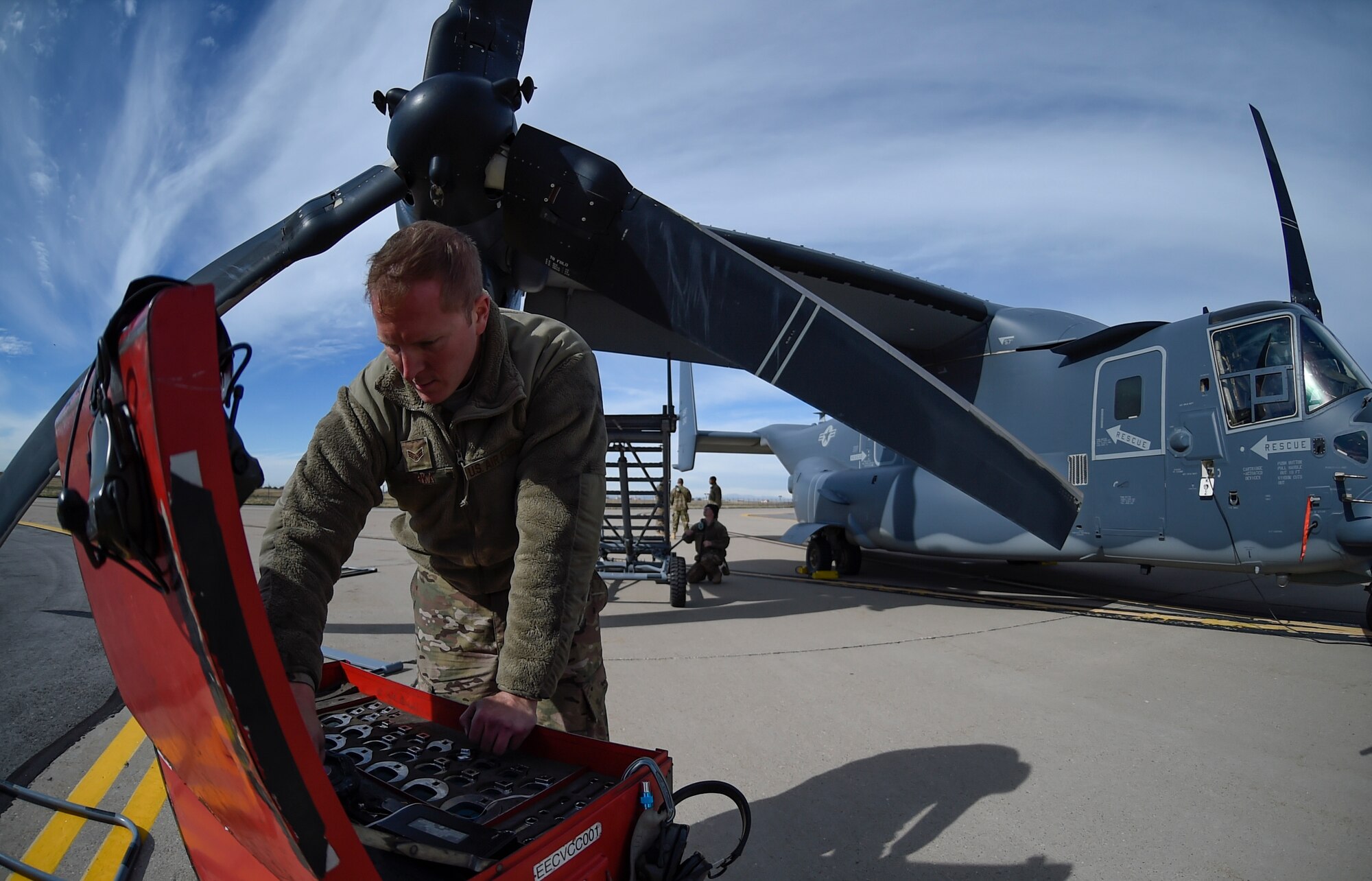 Airmen with the 901st Aircraft Maintenance Squadron finish repairs on a CV-22B Osprey at Hill Air Force Base, Utah, Nov. 2, 2015. The exercise allowed Airmen to perform their duties in a simulated expeditionary environment outside of their home stations. (U.S. Air Force by Airman Kai White)