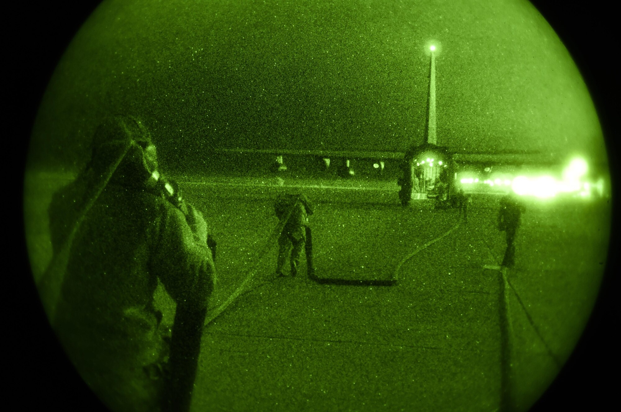 Airmen with the 1st Special Operations Wing pull a fuel hose to an MC-130H Combat Talon II during exercise Ultimate Archer at the Utah Test and Training Range, Utah, Nov. 3, 2015. The exercise allowed Airmen to perform their duties in a simulated expeditionary environment outside of their home stations. (U.S. Air Force by Airman Kai White)