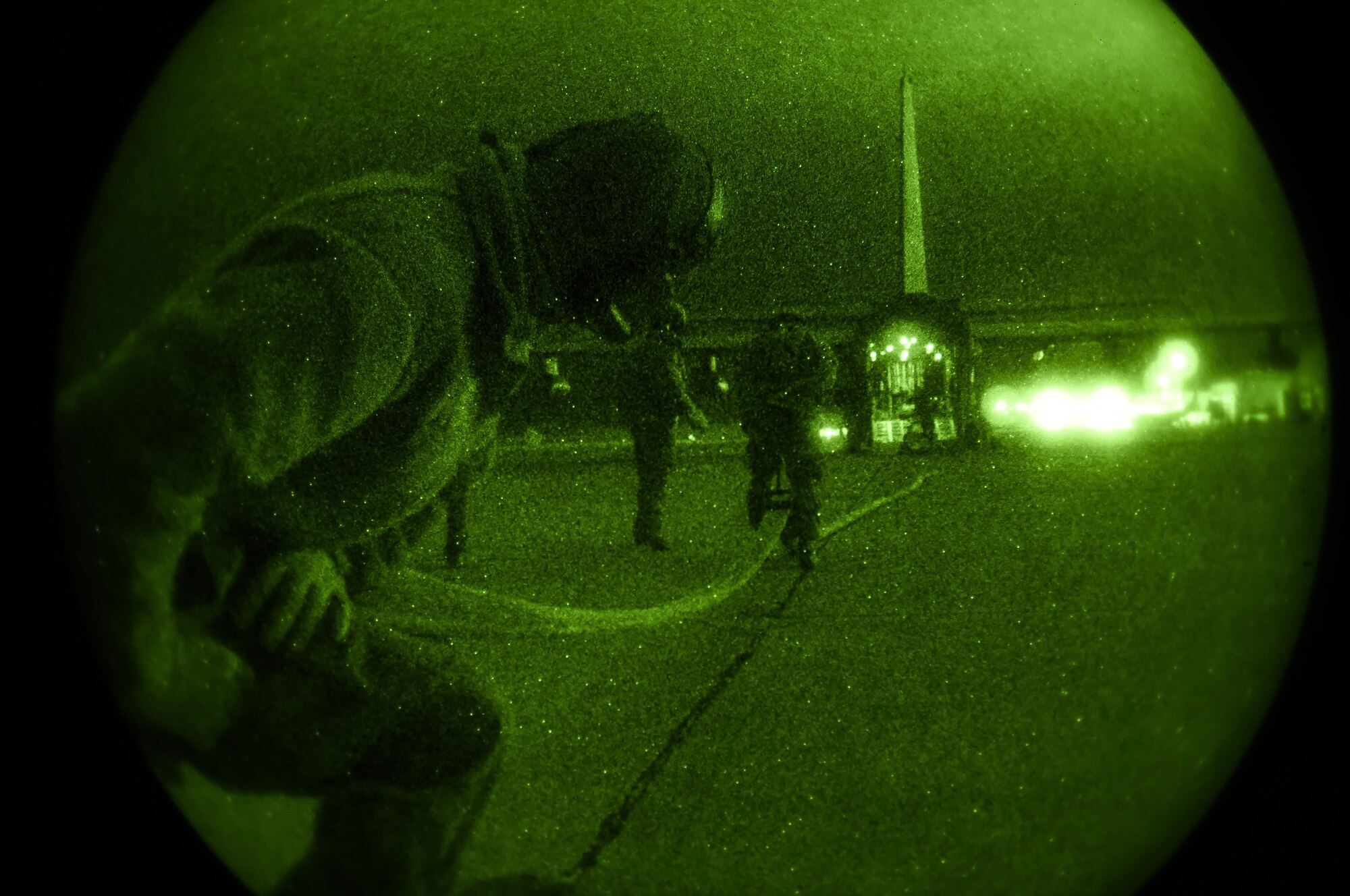 Airmen with the 1st Special Operations Wing clear a fuel line during forward area refueling point operations as part of exercise Ultimate Archer at the Utah Test and Training Range, Utah, Nov. 3, 2015. The exercise allowed Airmen to perform their duties in a simulated expeditionary environment outside of their home stations. (U.S. Air Force by Airman Kai White)