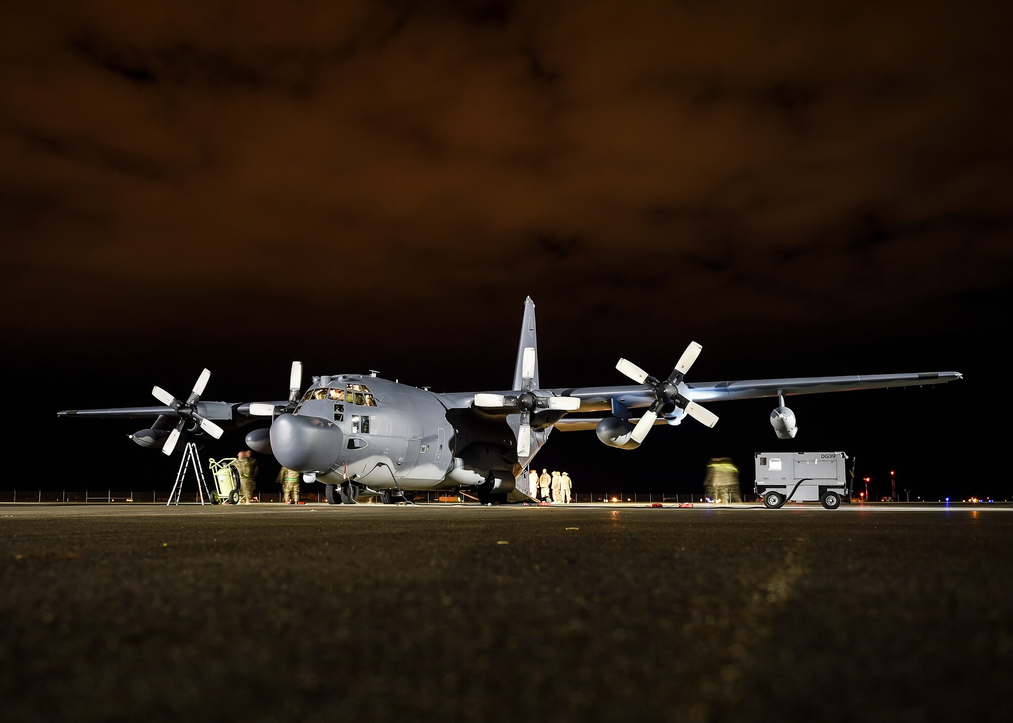 Airmen with the 1st Special Operations Wing inspect an MC-130H Combat Talon II after a forward area refueling point operation as part of exercise Ultimate Archer at Hill Air Force Base, Utah, Nov. 3, 2015. Airmen with the 1st Special Operations Wing practiced various skills required for overseas contingency operations during the exercise. (U.S. Air Force photo by Airman Kai White)